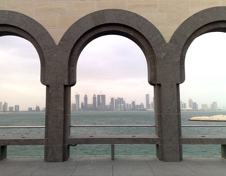 Doha skyline viewed through the arches of the Museum of Islamic Art